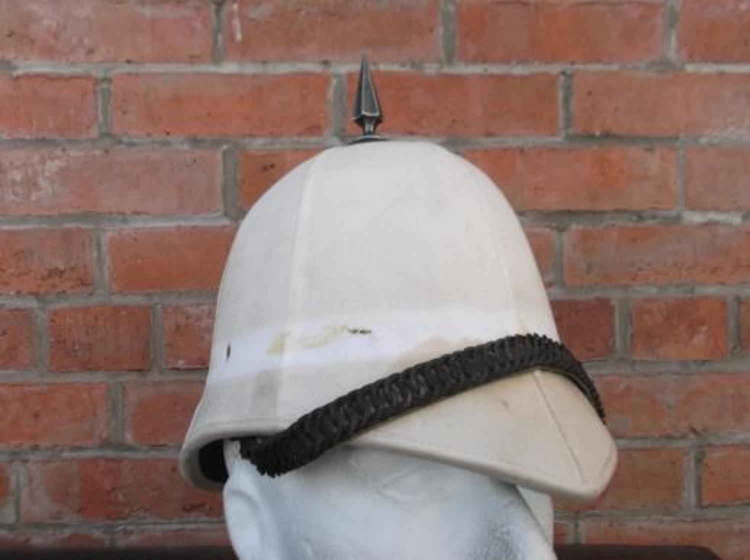 pith helmet crossword