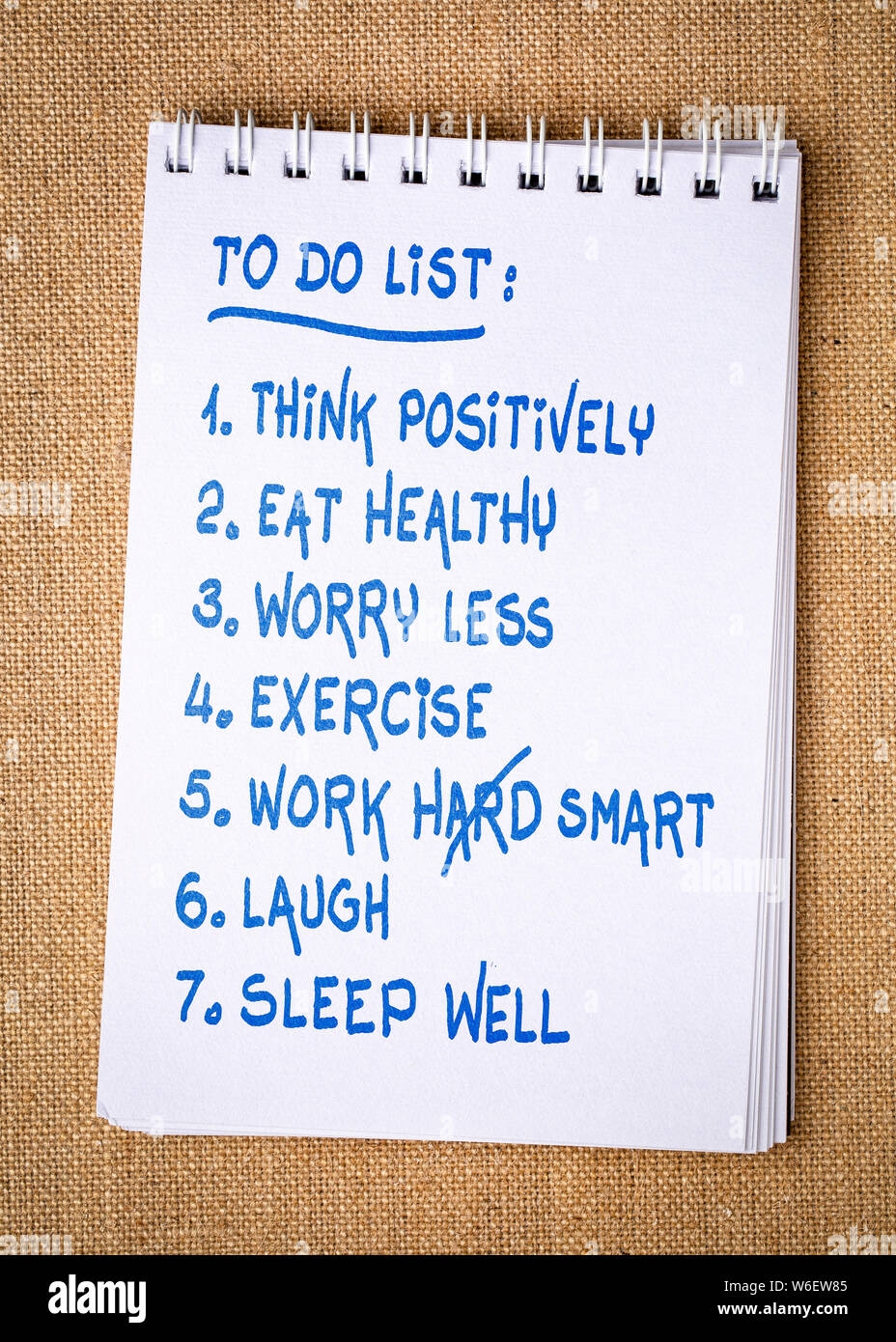 Inspiring And Positive To Do List Handwriting In A Spiral Sketchbook Against Burlap Canvas Background Stock Photo Alamy
