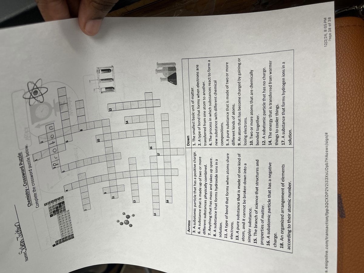 subatomic particle crossword clue